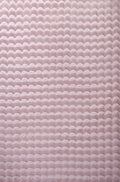 Baby Pink Orbie washable bobble rug, styled view