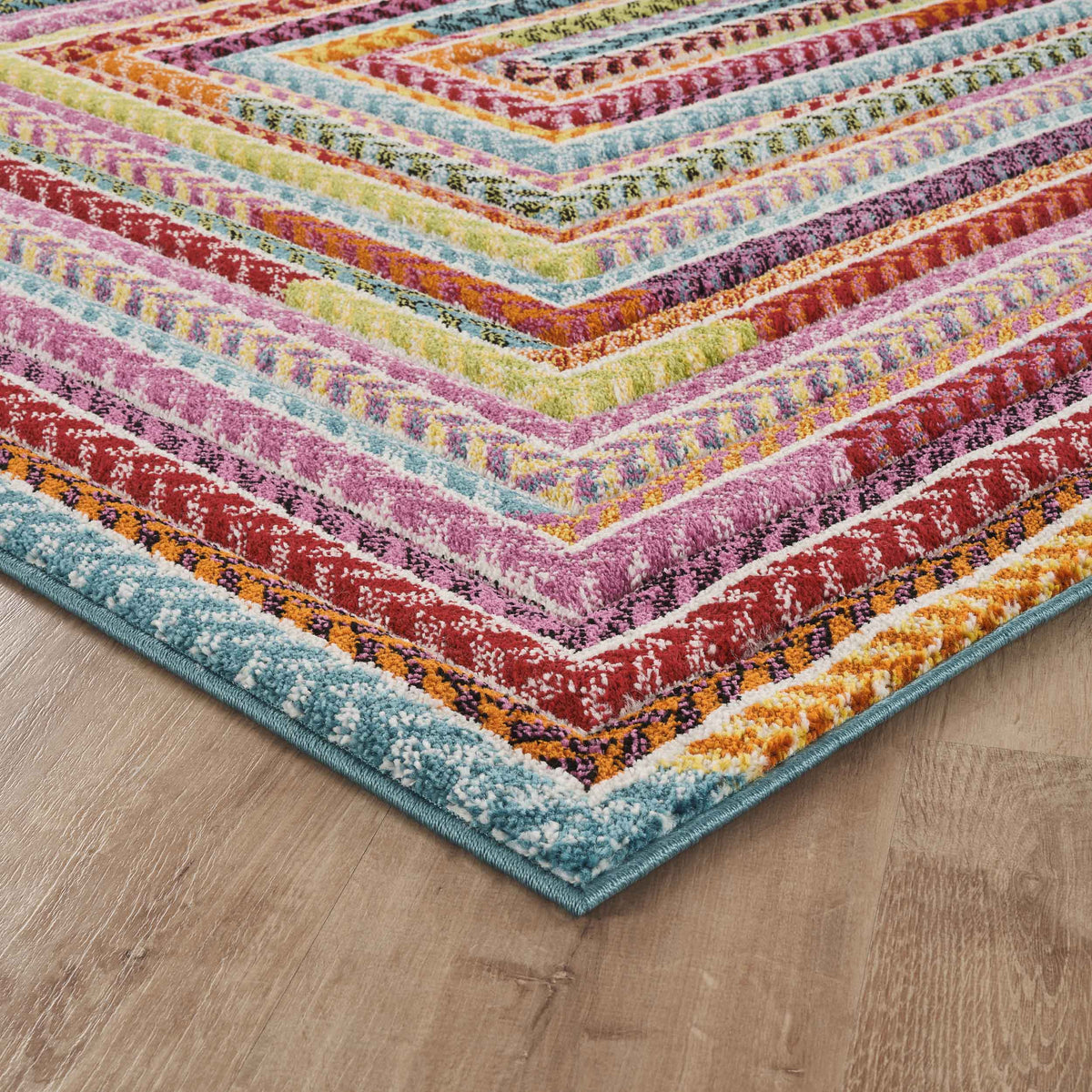 Rainbow Braided carved rug, close-up pile detail