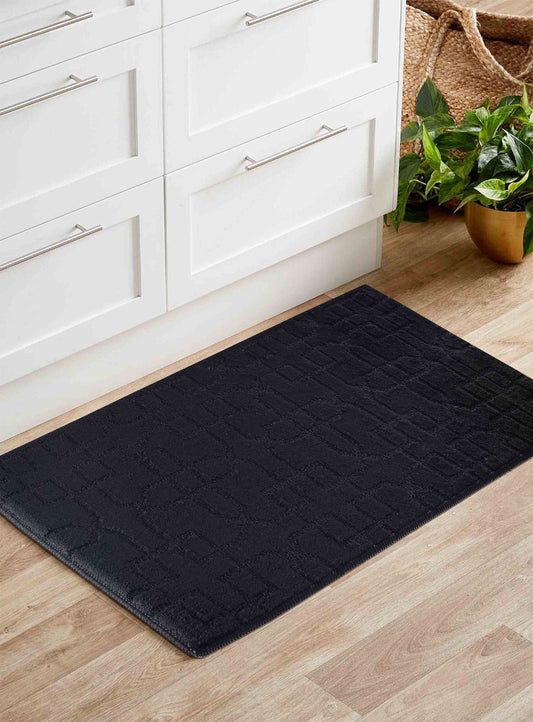 Black Ivy Siam door mat, in a room setting