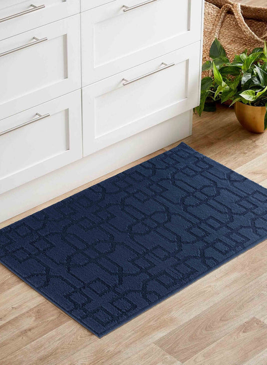 Navy Blue Ivy Siam door mat, in a room setting