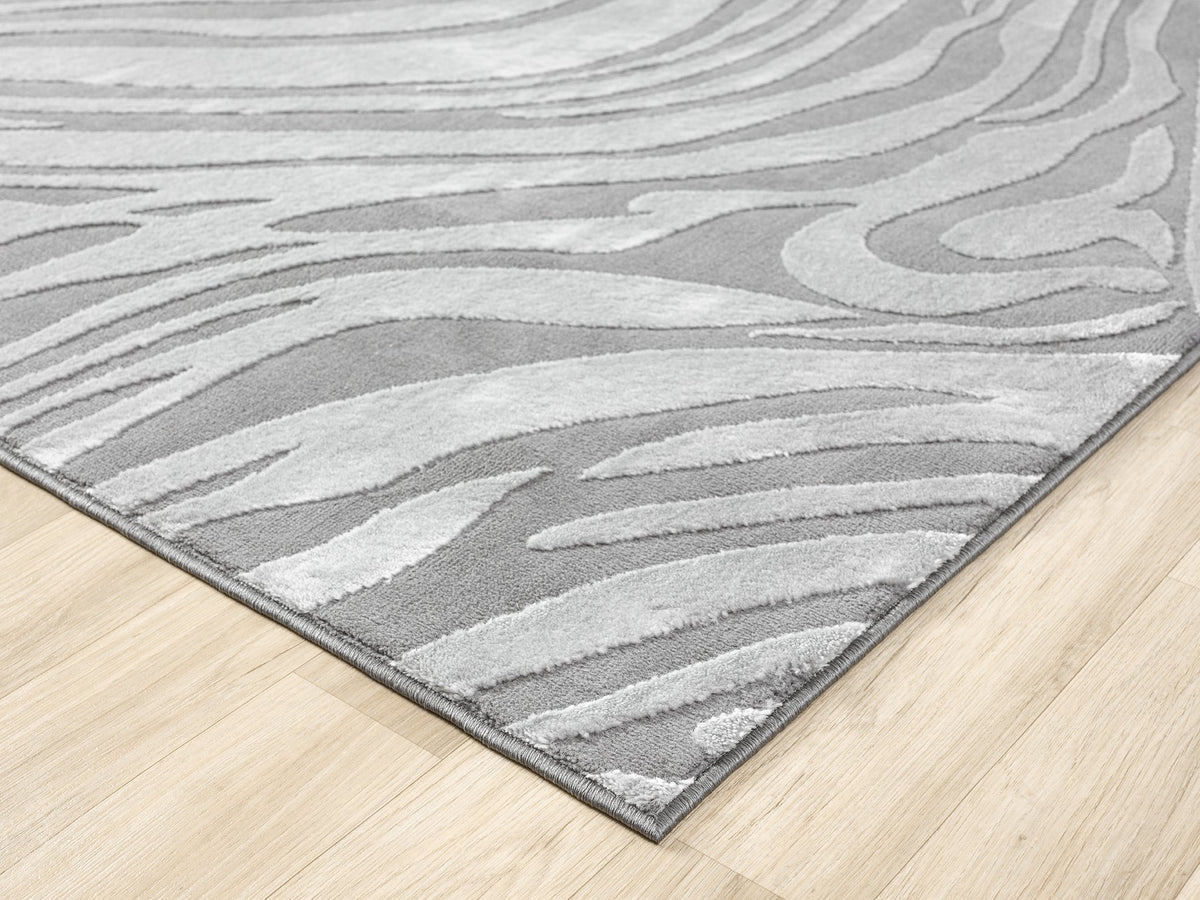 Anthracite Vellure Marble textured geometric rug, corner fold detail