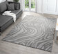 Anthracite Vellure Marble textured geometric rug, in a room setting