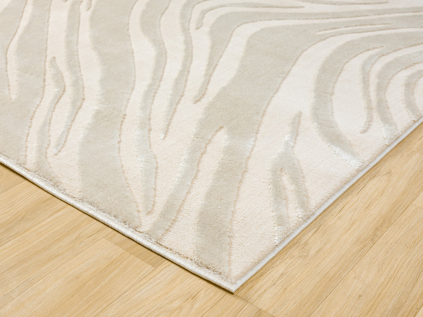 Cream Vellure Marble textured geometric rug, corner fold detail