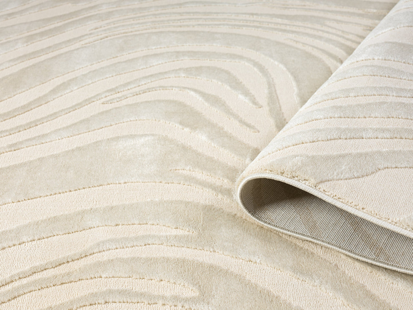 Cream Vellure Marble textured geometric rug, rolled view