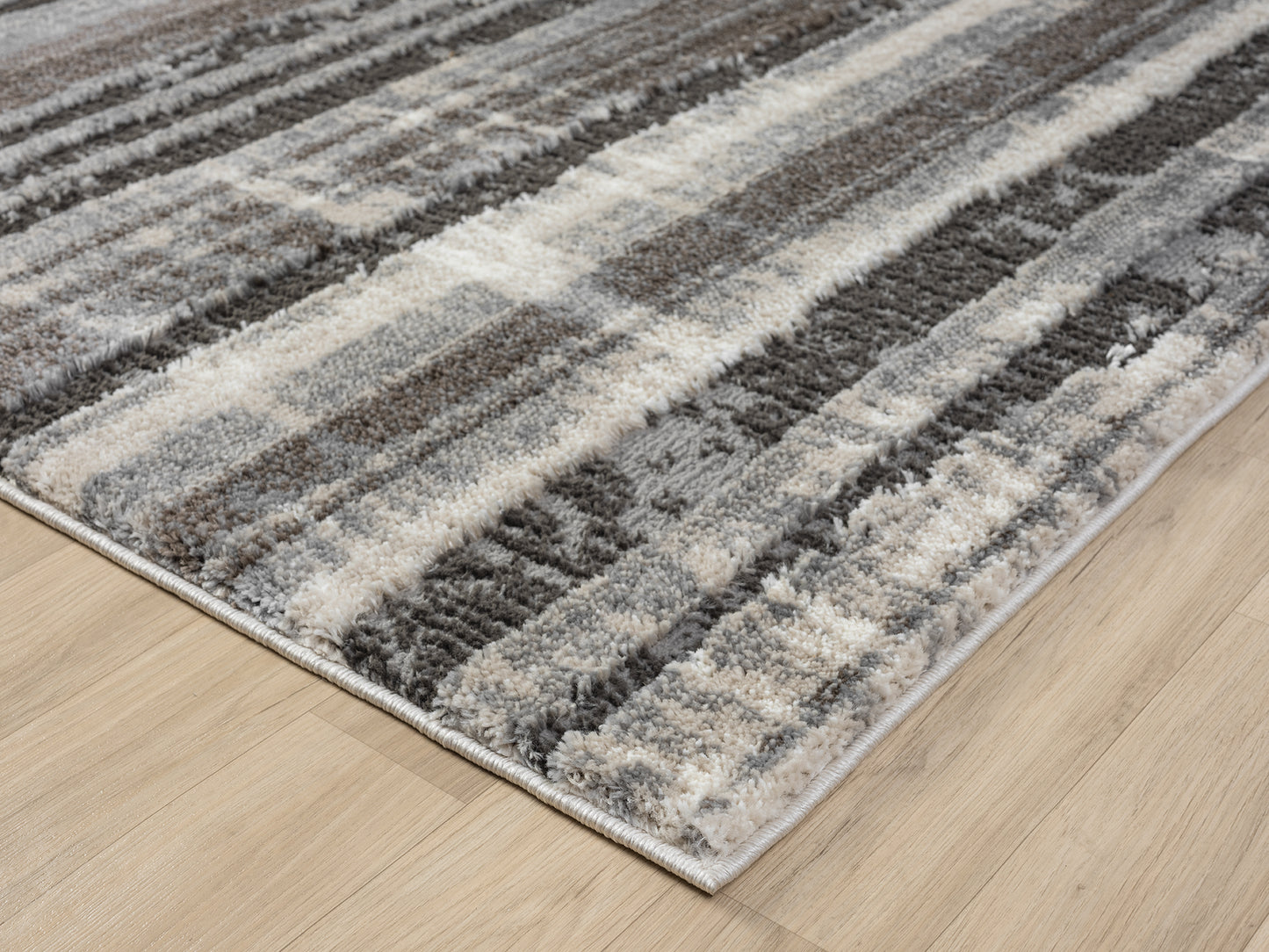 Grey Eleanor Linear embossed abstract rug, styled view