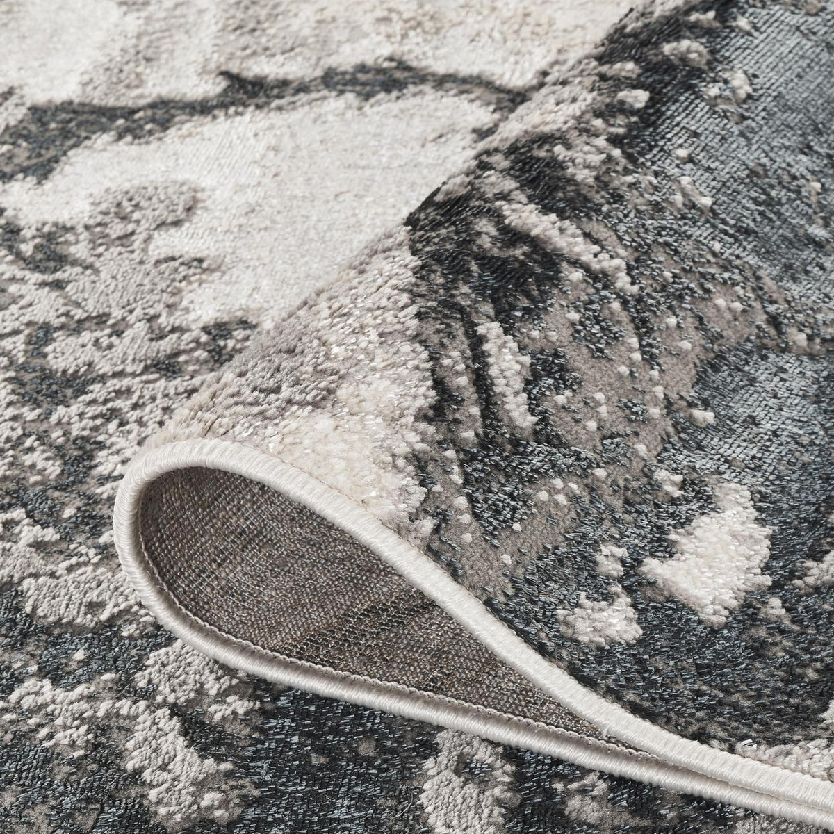 Elysium Huracan metallic abstract rug, styled view 3