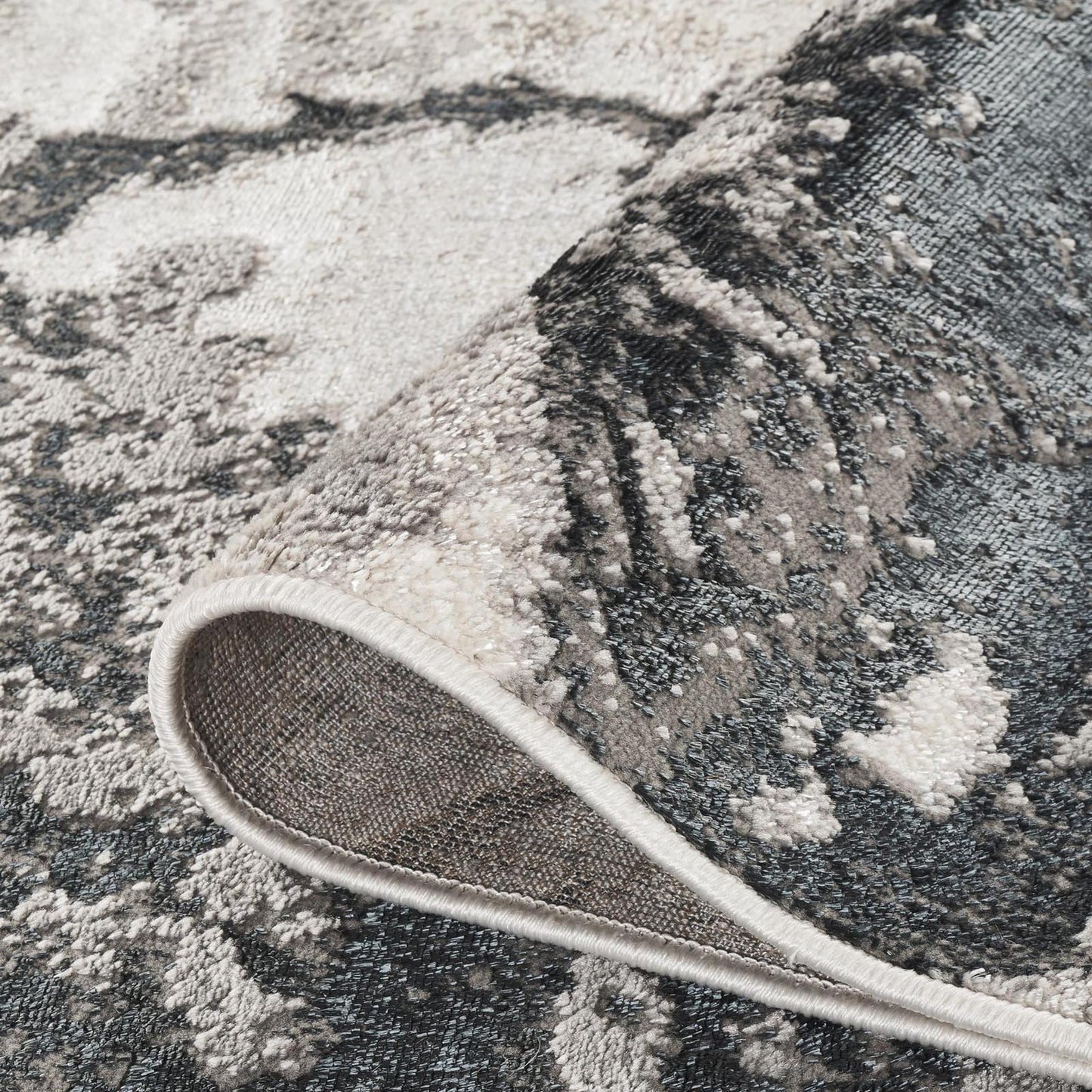 Elysium Huracan metallic abstract rug, styled view 3