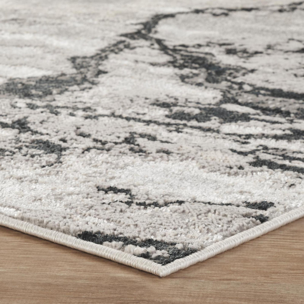 Elysium Huracan metallic abstract rug, styled view 4