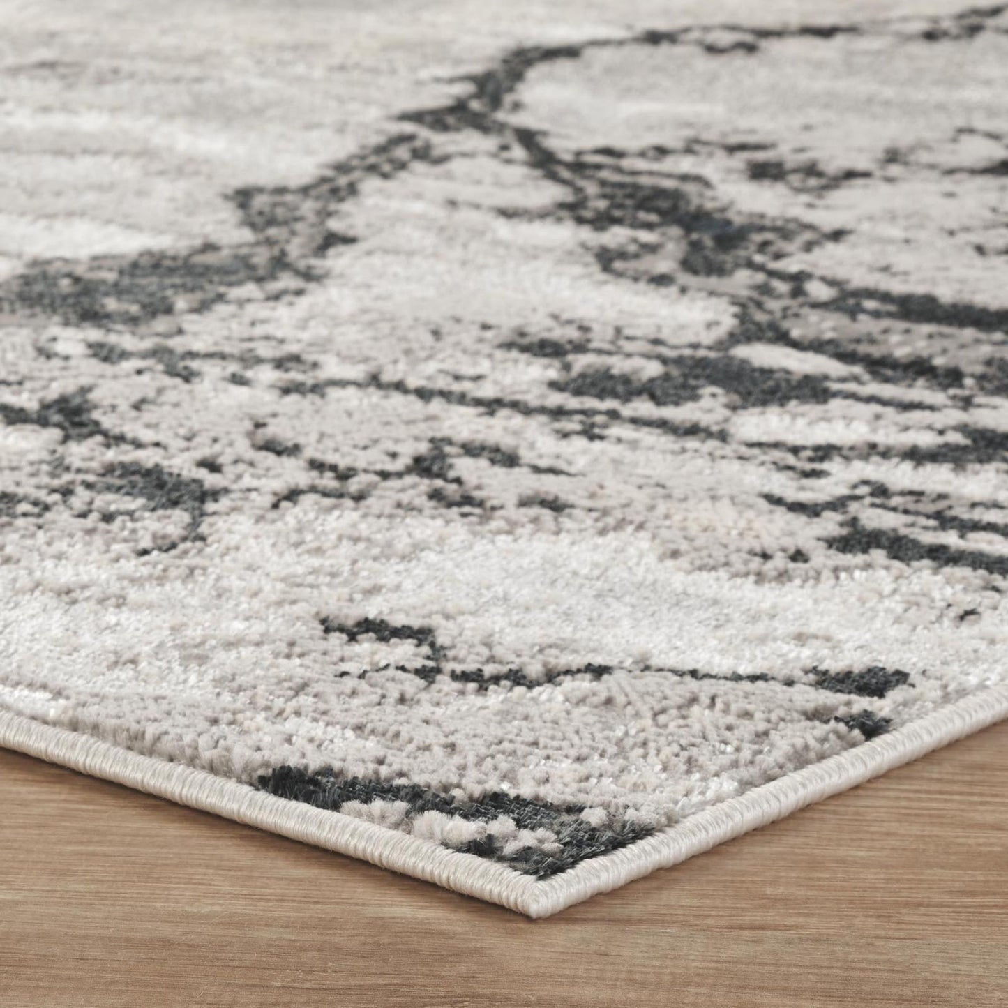 Elysium Huracan metallic abstract rug, styled view 4